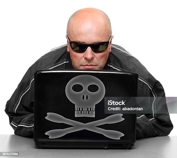 Dangerous Hacker With Laptop Stock Photo - Download Image Now - Adult, Adults Only, Blue-collar Worker