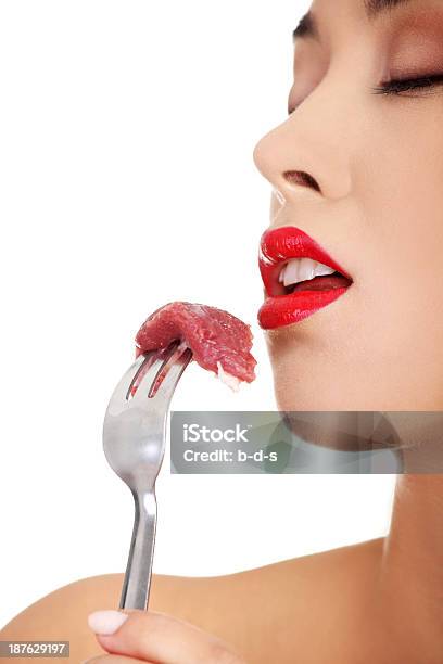 Young Beautiful Woman Eating Raw Meat Stock Photo - Download Image Now - Adult, Beautiful People, Beauty