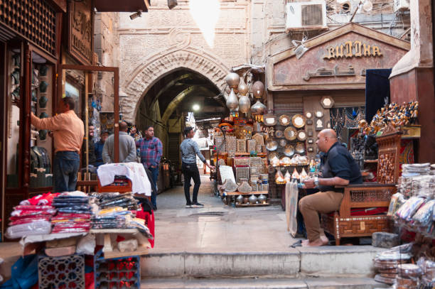 Cairo, Egypt - Dec. 15 2023: Streets and local shops in Khan el-Khalili bazaar in Cairo