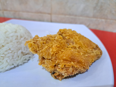 Delicious Crispy Fried Chicken Breast With Rice. Nasi Ayam Goreng Dada