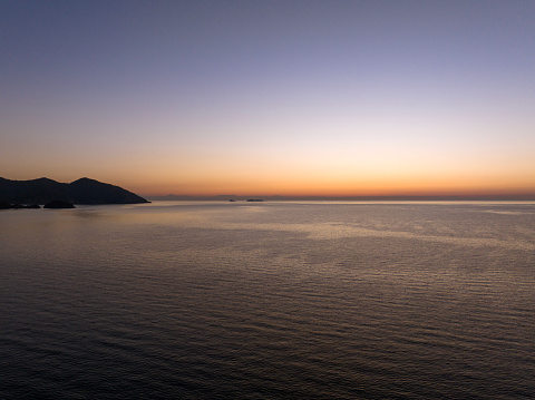 Aerial view of the Mediterranean Sea at sunrise in Antalya, Turkey.  Taken via drone.