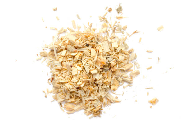 wood sawdust isolated on white background, top view. heap of sawdust isolated on white background. wood sawdust on a white background, top view. pile of wood shavings isolated on white background. - 鋸屑 個照片及圖片檔