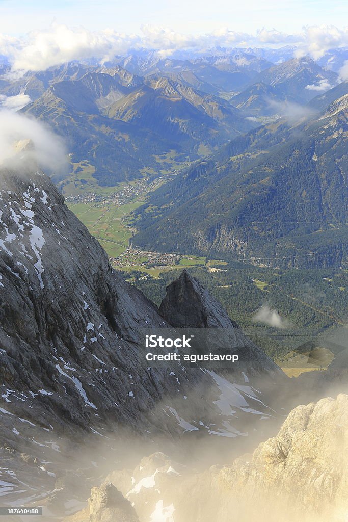 View of Austrian side from Zugspitze Mountain View of Austrian side from Zugspitze Mountain, the highest mountain in Germany. Austria Stock Photo