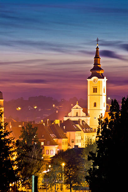 istock Church tower in colorful dusk 187643837
