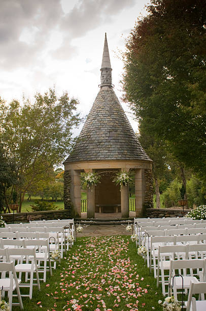 istock Wedding Ceremony with Stone Gazebo and Chairs 187644913