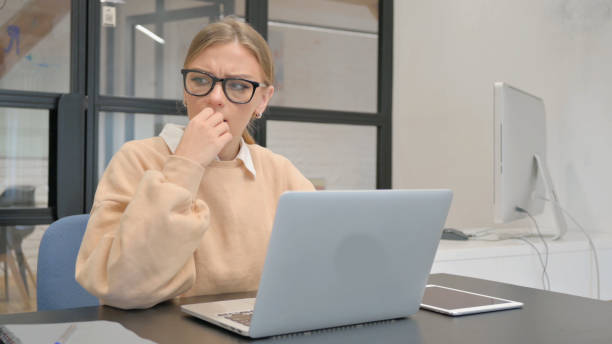 istock Angry Female Worker Feeling Frustrated while Working on Laptop 1876449541