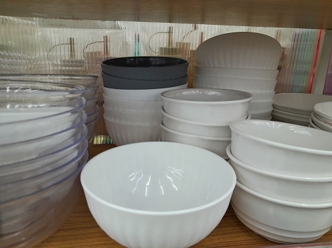 photo of a stack of bowls on a storage shelf