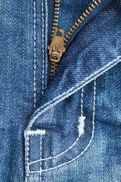 istock The rack of blue jeans 187645460