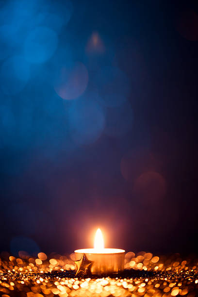 Navidad té luz de las velas-Decoración de oro Bokeh Desenfocado - foto de stock