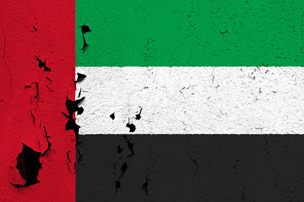 Flag of United Arab Emirates The flag of United Arab Emirates painted on a cracked and peeling wall. علم الإمارات العربية المتحدة stock pictures, royalty-free photos & images