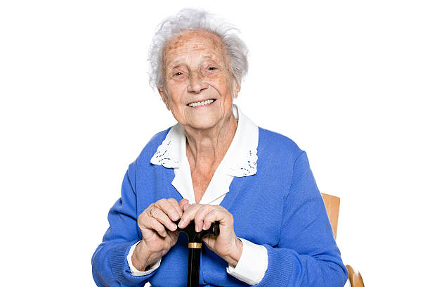 istock Senior woman with cane 187647948