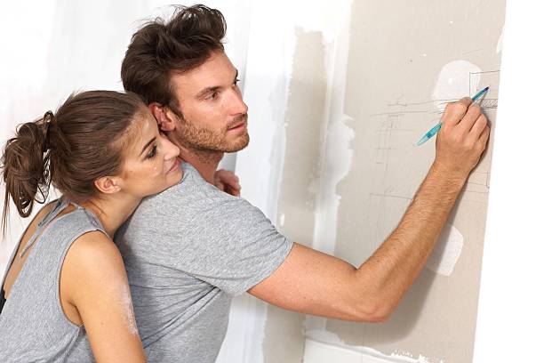 istock Young couple planning new home 187648690