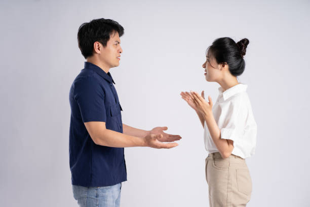 istock Image of an Asian couple posing on a white background 1876498840