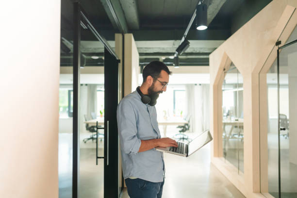 istock Portrait of a young man in his office 1876507986