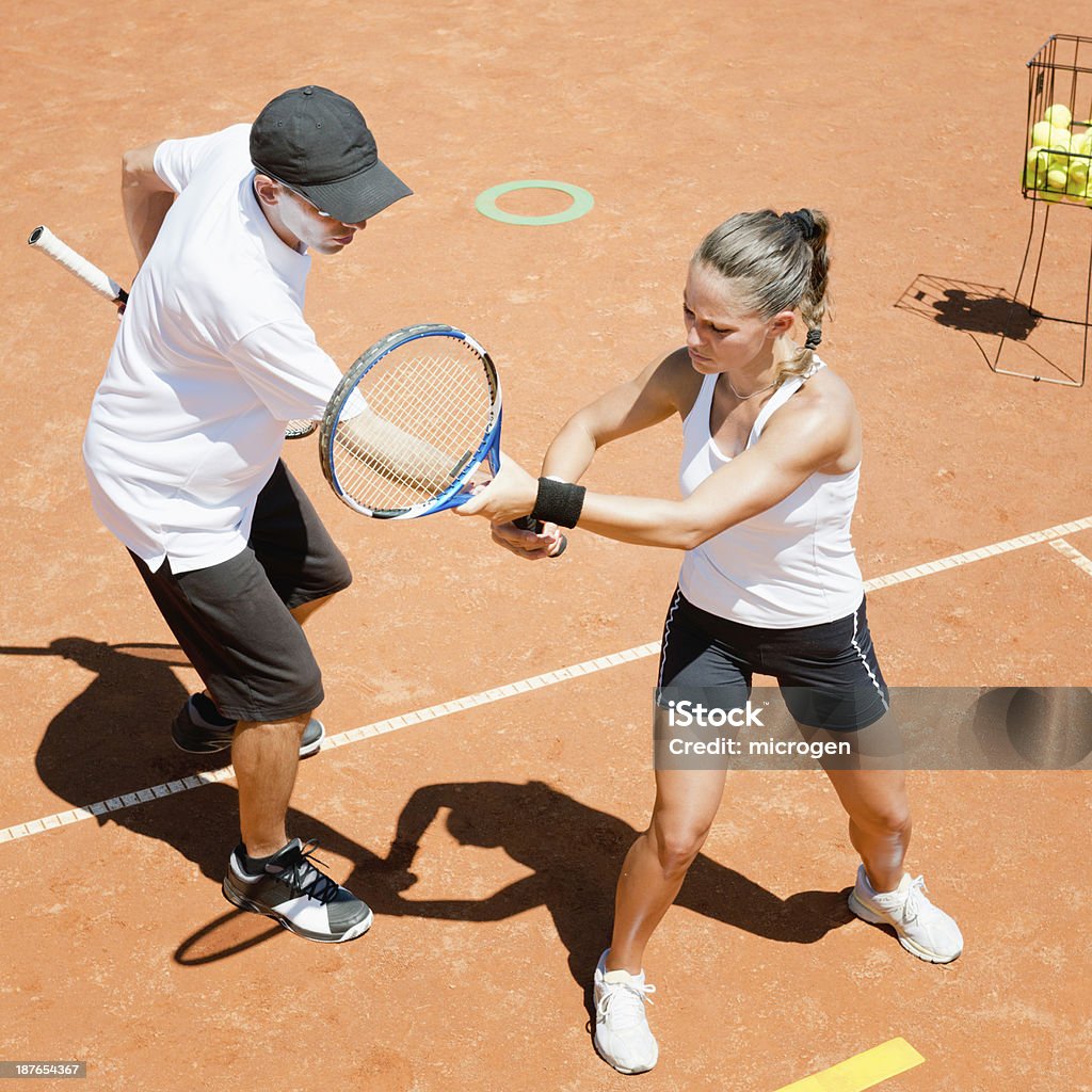 Lezione di Tennis - Foto stock royalty-free di Abbigliamento da tennis