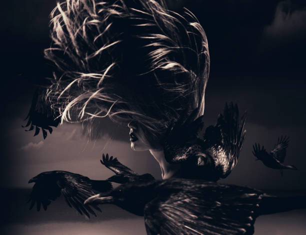 istock Young woman in motion with flying ravens 1876567292