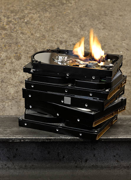 burning hard drive stock photo