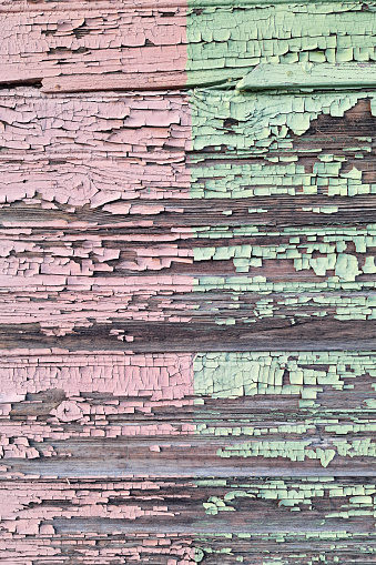 Two-color wall made of old wooden planks
