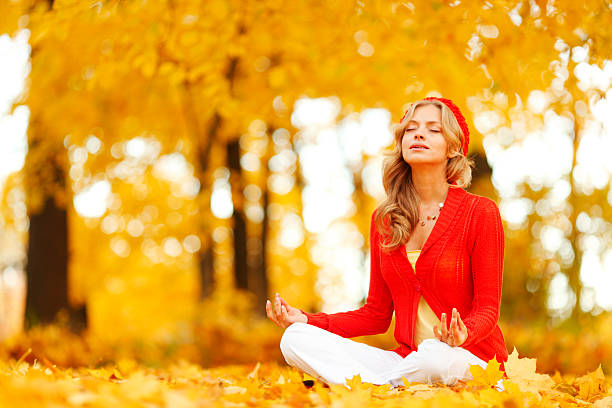 istock Autumn yoga woman 187660252