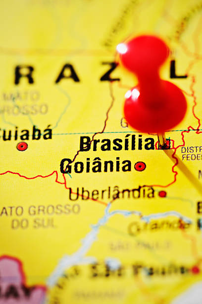 Brasilia, Brazil, pinpointed on map A red pushpin  is stuck into Brasilia, capital of Brazil, soon to host the 2014 FIFA World Cup, on a map of part of South America. uberlandia stock pictures, royalty-free photos & images