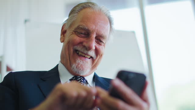 Laughing  texting on phone, thinking and investing in business agreement