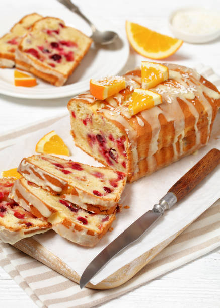 istock orange cranberry loaf with orange glaze, top view 1876620587