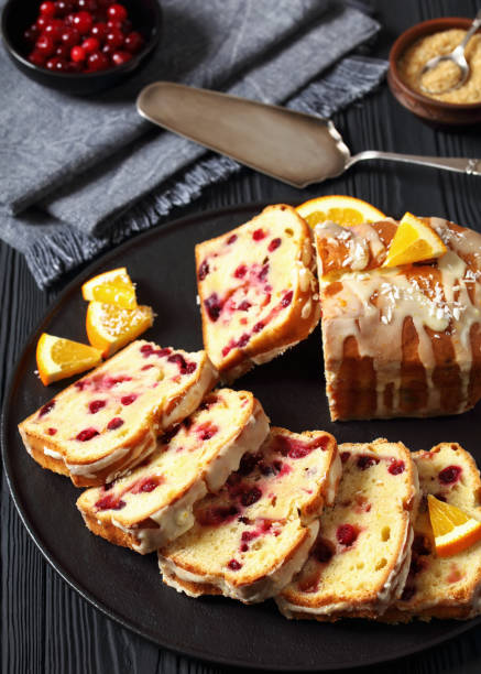 istock orange cranberry loaf with orange glaze, top view 1876621097