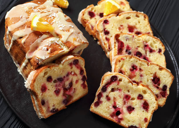istock orange cranberry loaf with orange glaze, top view 1876621101