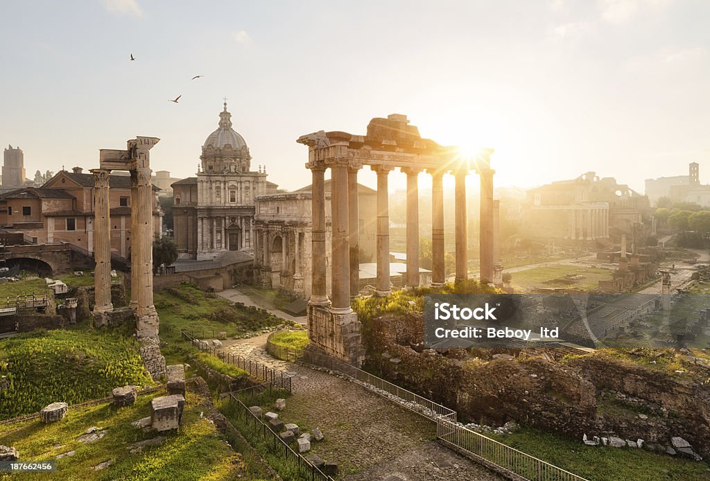 Roman ruins in Rome, Forum Roman ruins in Rome, Forum at sunrise Ancient Stock Photo