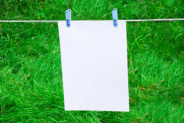 istock page or note on the clotherline with clotherspins 187663794