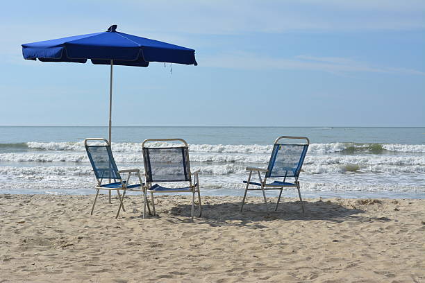 istock Chairs with umbrella on the beach 187663827