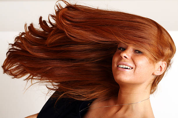 istock young beautiful redhead woman 187664646