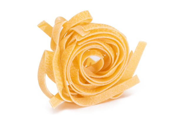 istock One Classic Italian Raw Egg Fettuccine - Isolated on White Background 1876647889