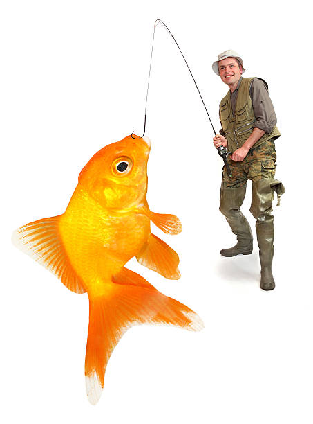 istock The fisherman with his big Goldfish. 187665388