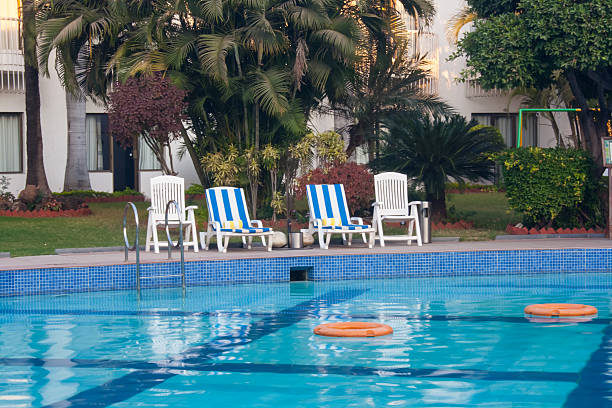 istock swimming pool in morning 187665443