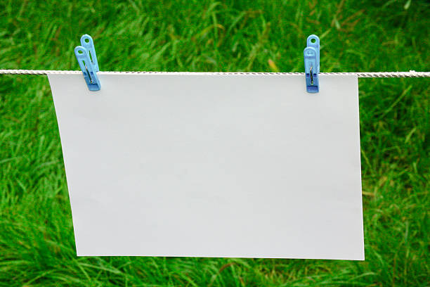 istock page or note on the clotherline with clotherspins 187665481