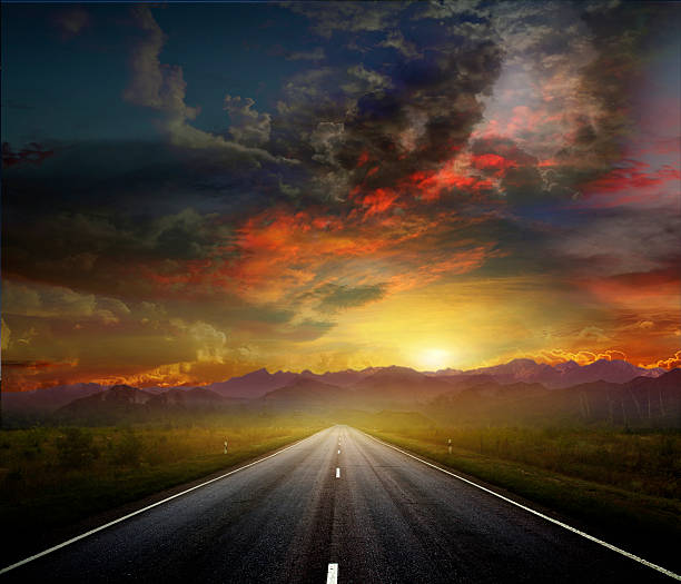 istock Country road with a dark sky 187665935