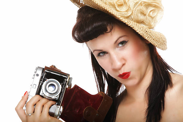 istock Pretty retro girl in hat with vintage camera 187667147