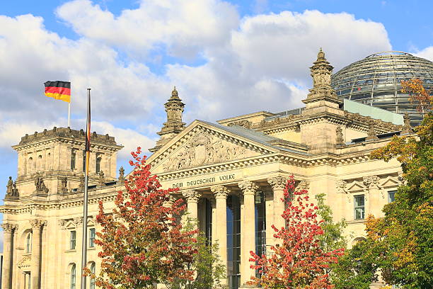 istock German Reichstag in Berlin with slight clouds 187671191