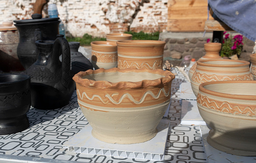 Pots in the shop. Ceramics. Cultural traditions. Self made. Craft