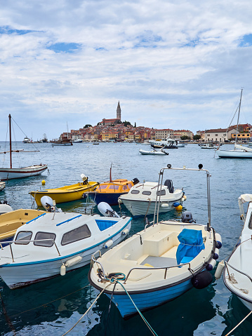 The colorful town of Rovinj with the tower of the Church of St. Euphemia seen from the harbor. Istria, Croatia, Europe