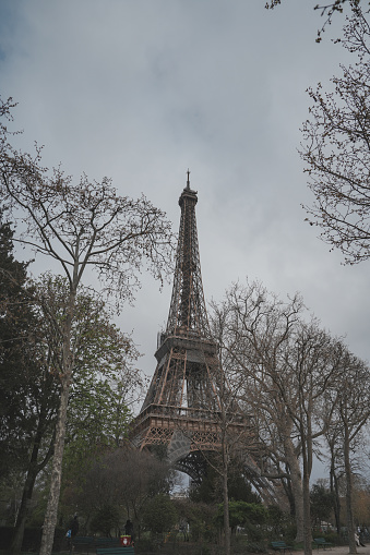 Pollution in Paris, aerial view of Eiffel Tower with smog in background