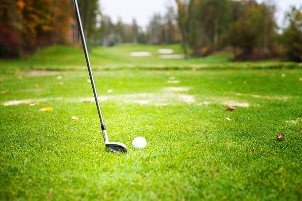istock Golf ball before hitting with club from tee 187673791