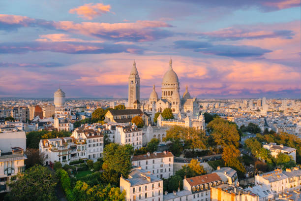 Aerial view of Montmartre hill with Basilique du Sacre-Coeur in Paris during sunset Paris France Aerial view of Montmartre hill with Basilique du Sacre-Coeur in Paris during sunset Paris France choeur stock pictures, royalty-free photos & images