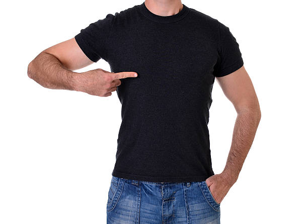 t-shirt Man pointing to the blank black t-shirt man muscular chest stock pictures, royalty-free photos & images