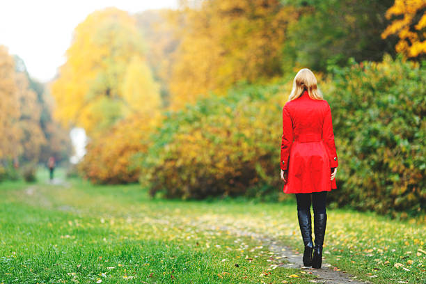 istock Woman in autumn park 187675186