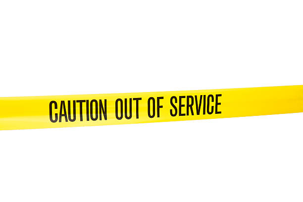 istock Barricade Tape - Caution out of service 187675332
