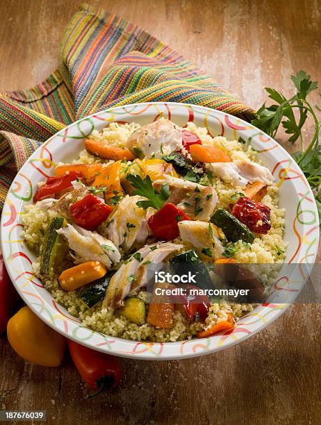 Couscous With Fish And Vegetables Stock Photo - Download Image Now - Couscous, Fish, Crockery