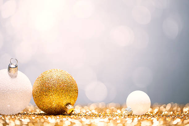 istock Christmas Baubles -  Bokeh Defocused Decoration Gold White 187676526