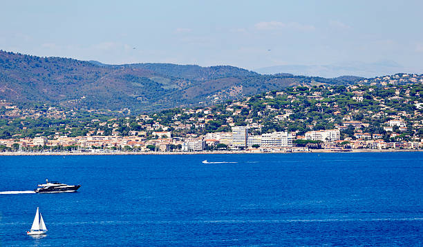Saint Maxime French Riviera The small town of Sainte Maxime on the  Gulf of Saint Tropez on the French Riviera in the Var Region of Provence. The town runs a frequent ferry service across to Saint Tropez.  Good copy space. pinus pinea photos stock pictures, royalty-free photos & images